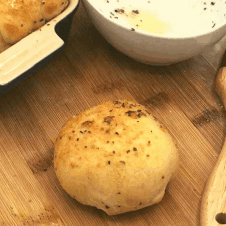 Air fryer cheese stuffed garlic rolls with melted cheese and golden garlic butter crust.