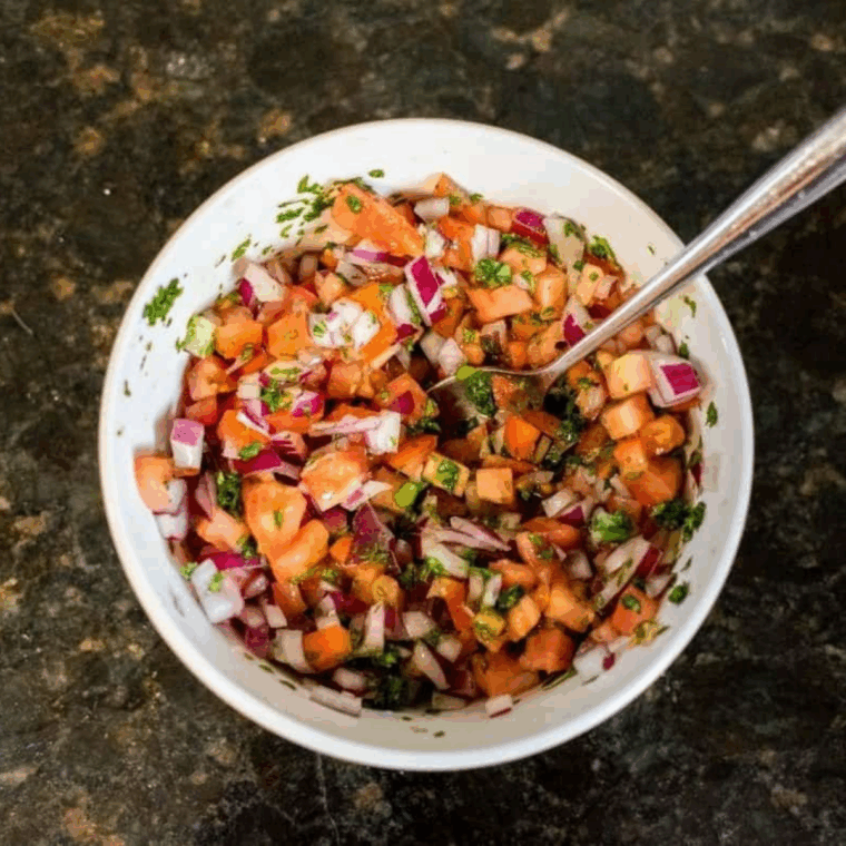 Prepping ingredients for chicken fajita rice bowls, including pico de gallo, guacamole, and drained black beans.