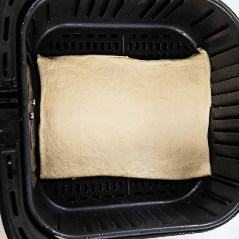 Place dough into the air fryer basket.