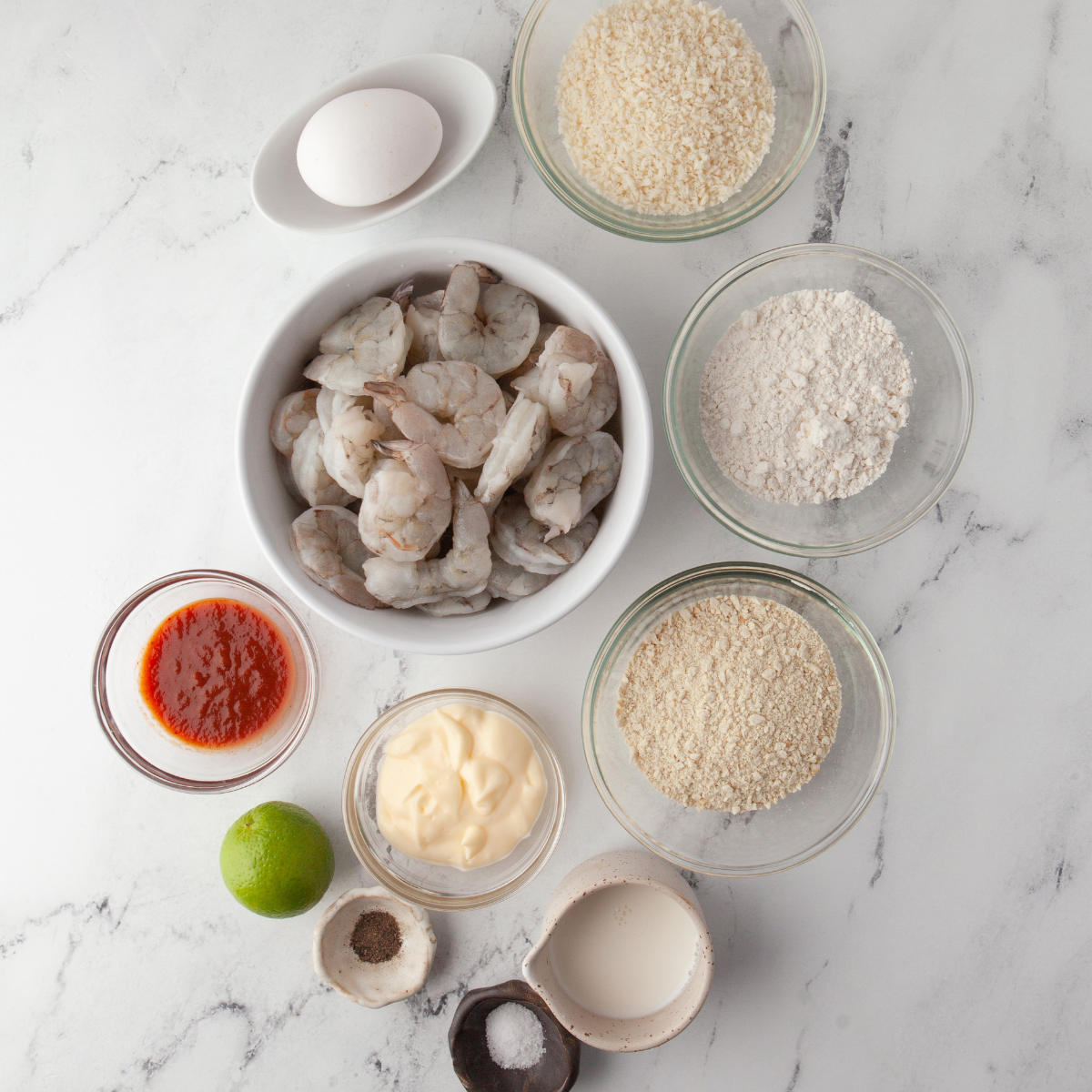 Ingredients needed for Easy Air Fryer Butterfly Shrimp on kitchen table.