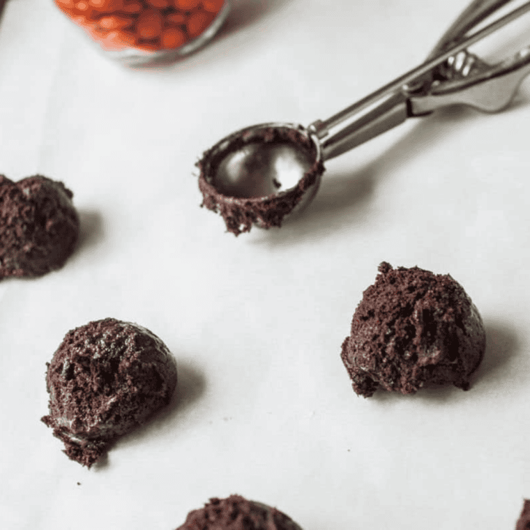 Line air fryer basket with parchment paper.