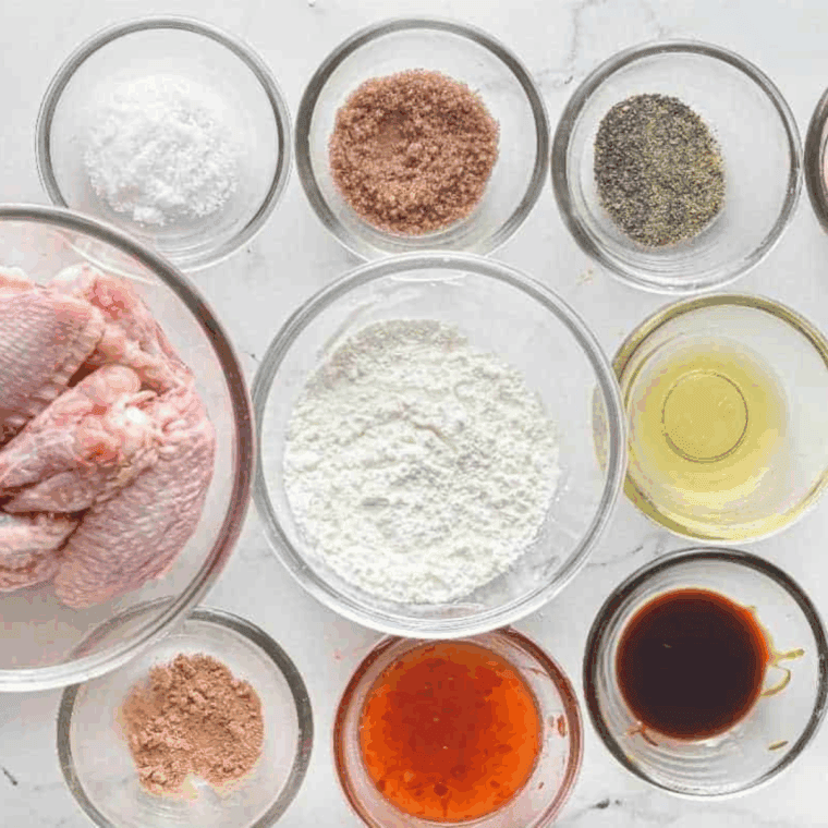 Ingredients needed for Easy Air Fryer Sweet Chili Chicken Wings on kitchen table.
