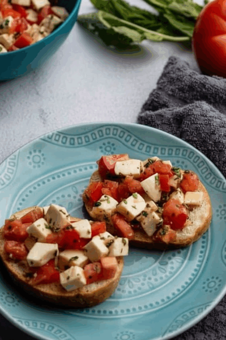 Close up of Air Fryer Tomato and Buffalo Mozzarella Bruschetta on kitchen table.