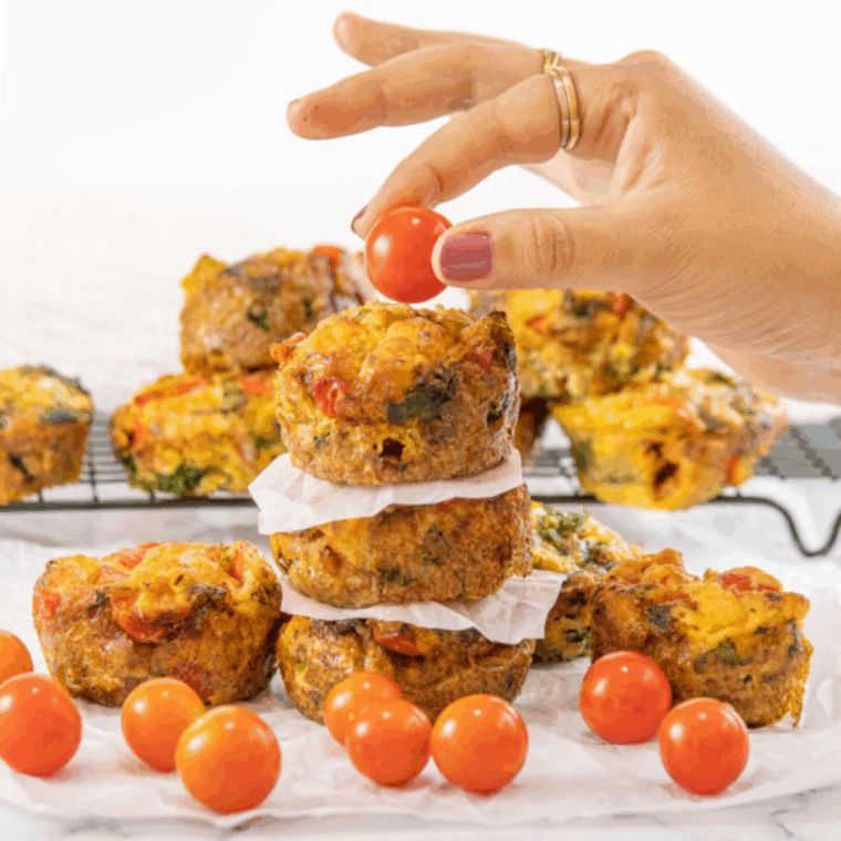 Freshly baked air fryer vegetable savory muffins with colorful vegetables and fluffy texture, ready to serve.