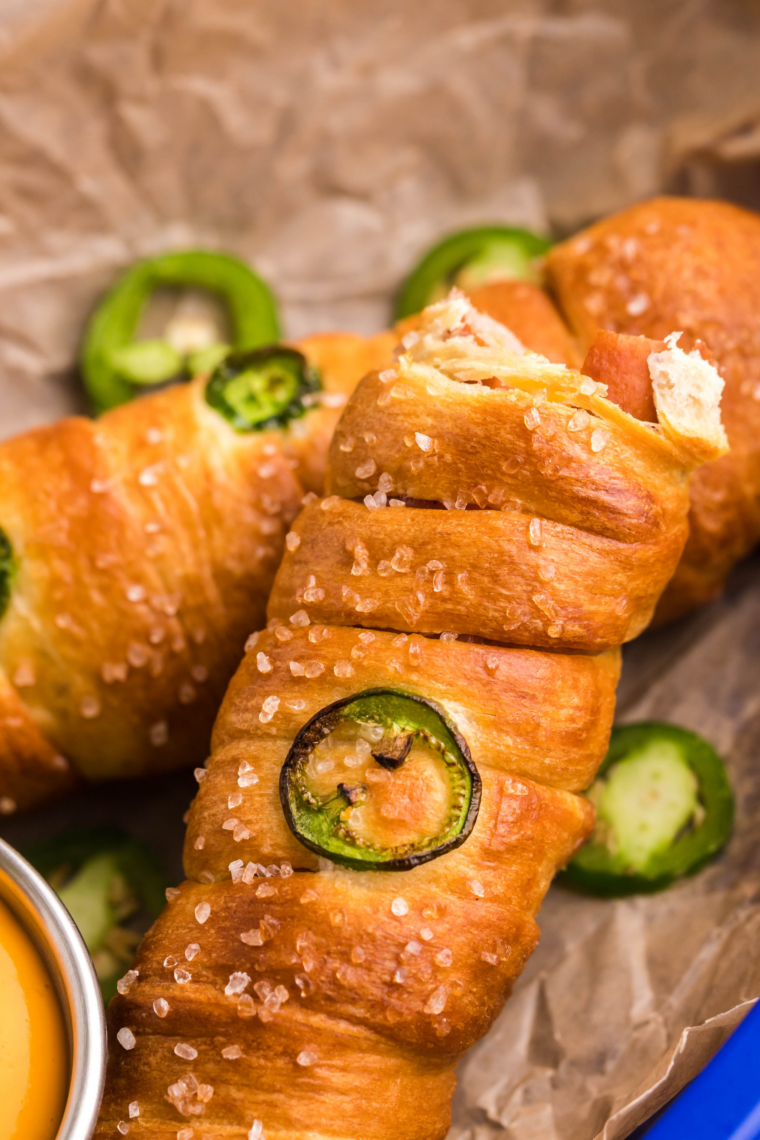 Hot air fryer pretzel dogs brushed with melted butter