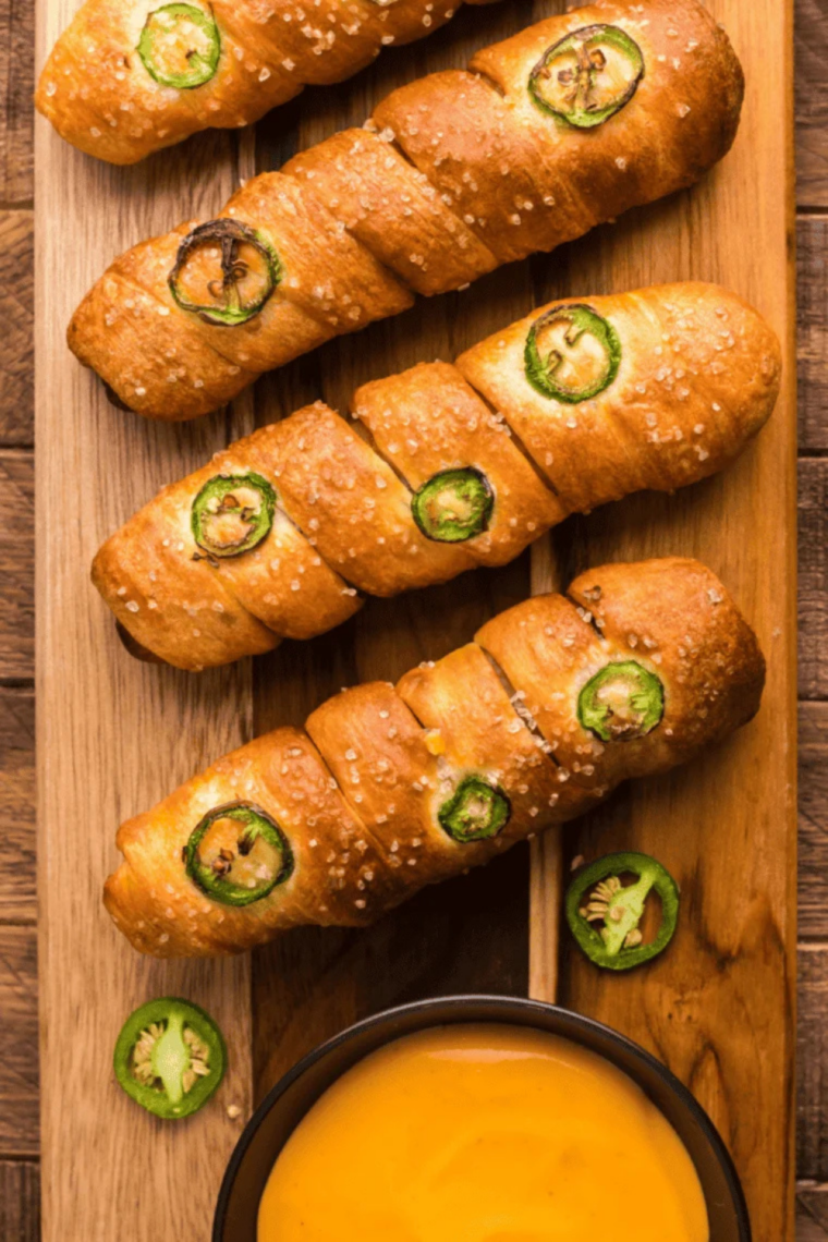 Applebee's Brew Pub Pretzels and beer cheese dip served on a wooden board