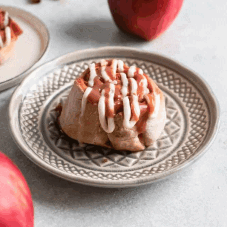 Easy Air Fryer Apple Cinnamon Rolls baked until golden with soft apples and cinnamon swirl filling.