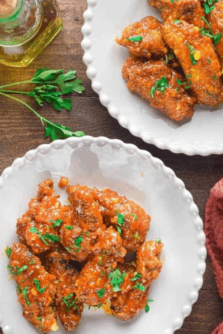 Close-up of sticky, flavorful sweet chili chicken wings ready to enjoy.