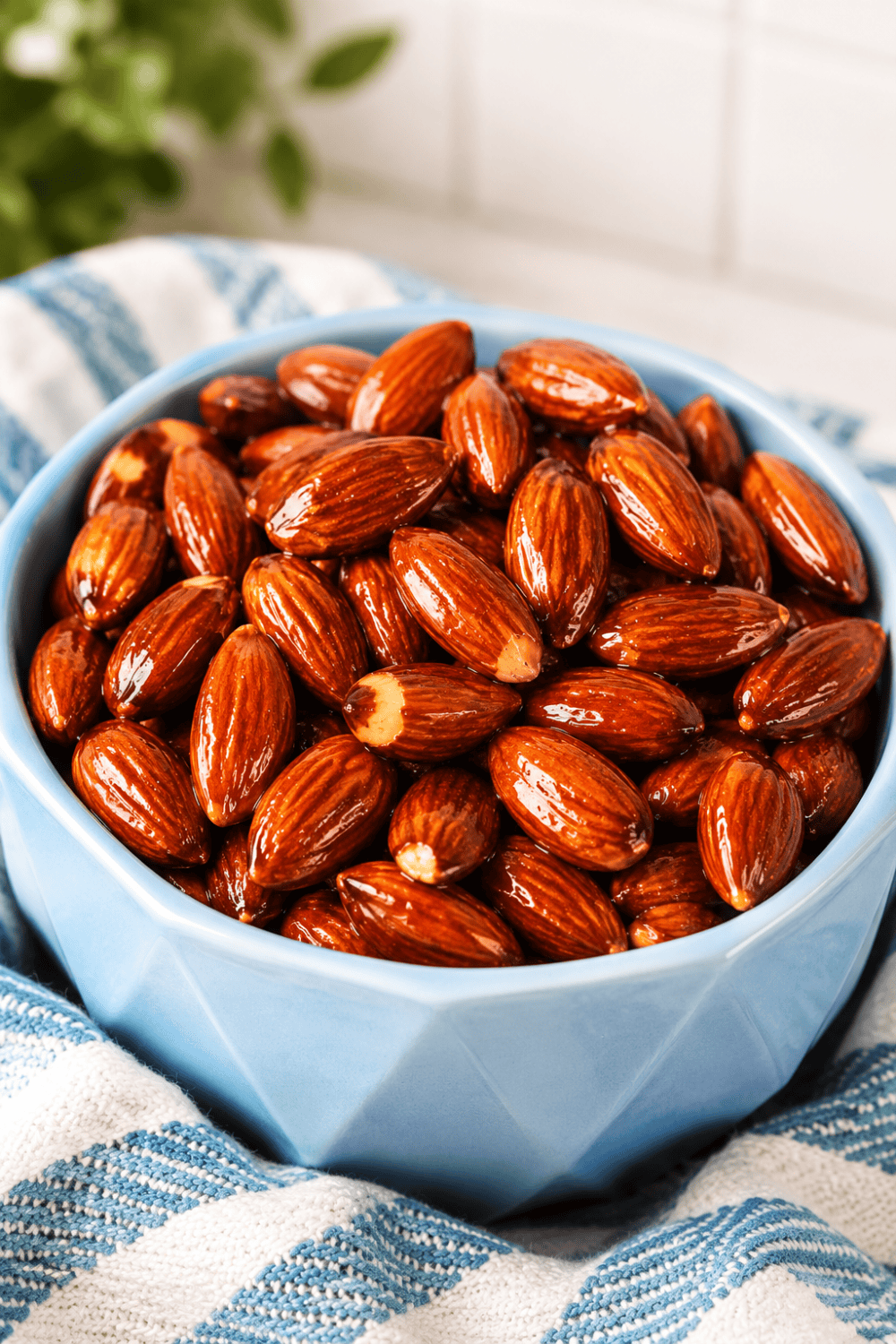Air fryer honey roasted almonds in a white bowl