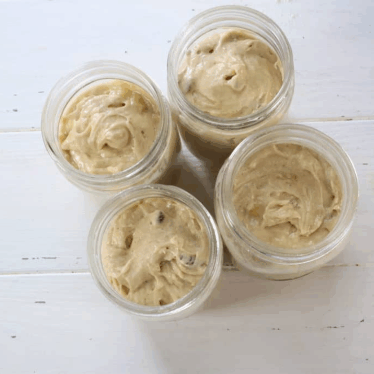 Pour the banana bread batter into the mason jars, filling about 2/3 the way full.