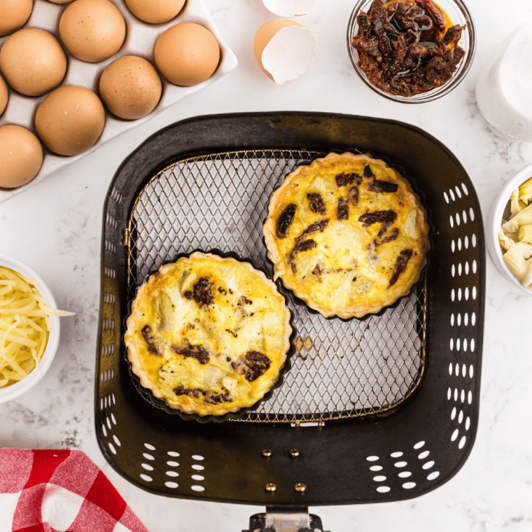 Whisked egg and cream poured over the quiche filling before air frying.
