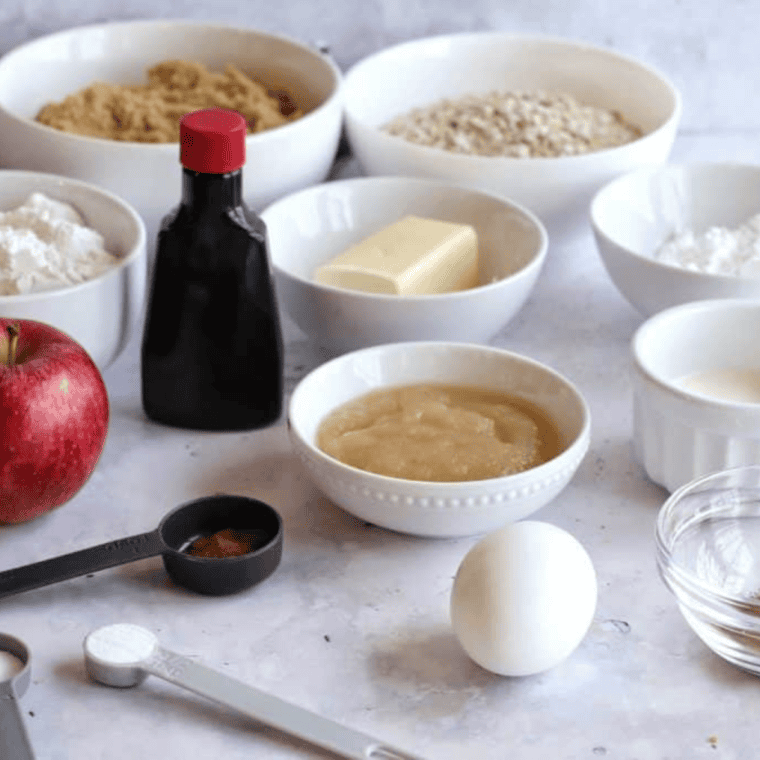 Ingredients needed for Air Fryer Apple Cinnamon Oatmeal Cookies on kitchen table.