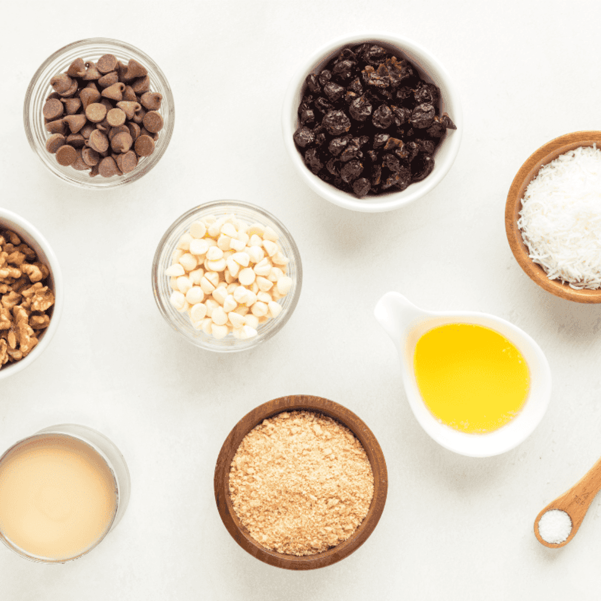 Ingredients needed for Air Fryer Cranberry Magic Cookie Bars on kitchen table.