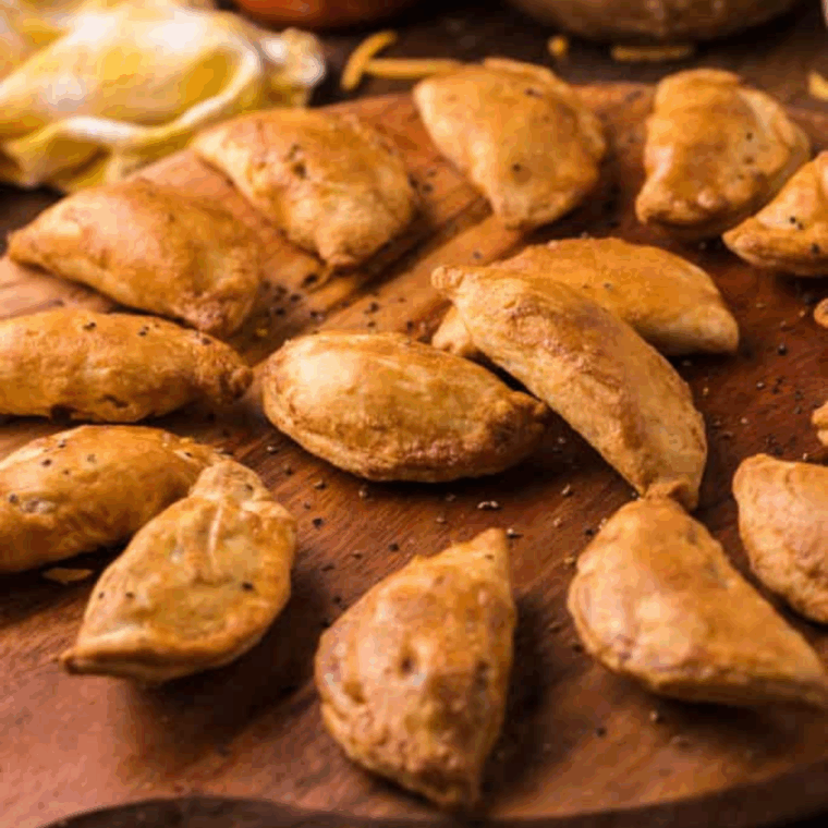 Crispy air fryer meat pies ready to eat.