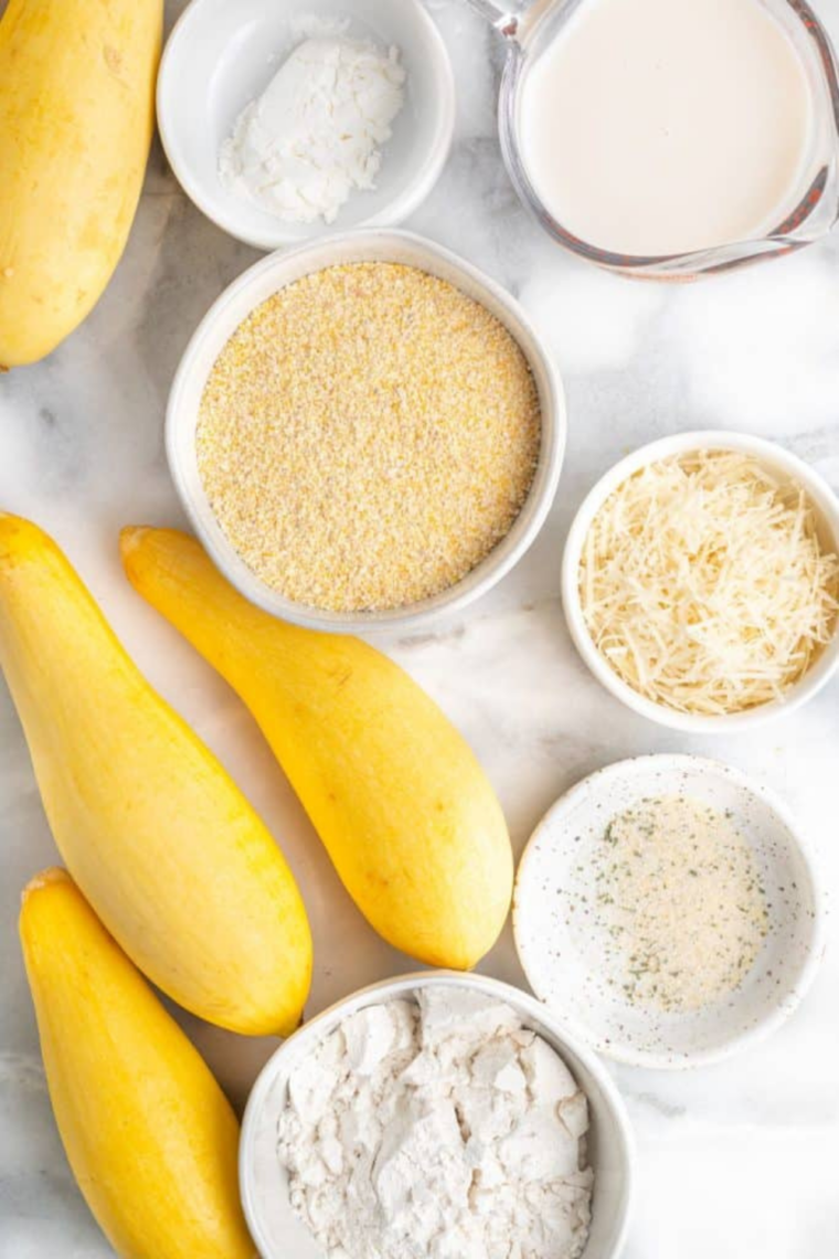 Ingredients needed for  Crispy Air Fryer Yellow Squash on kitchen table.