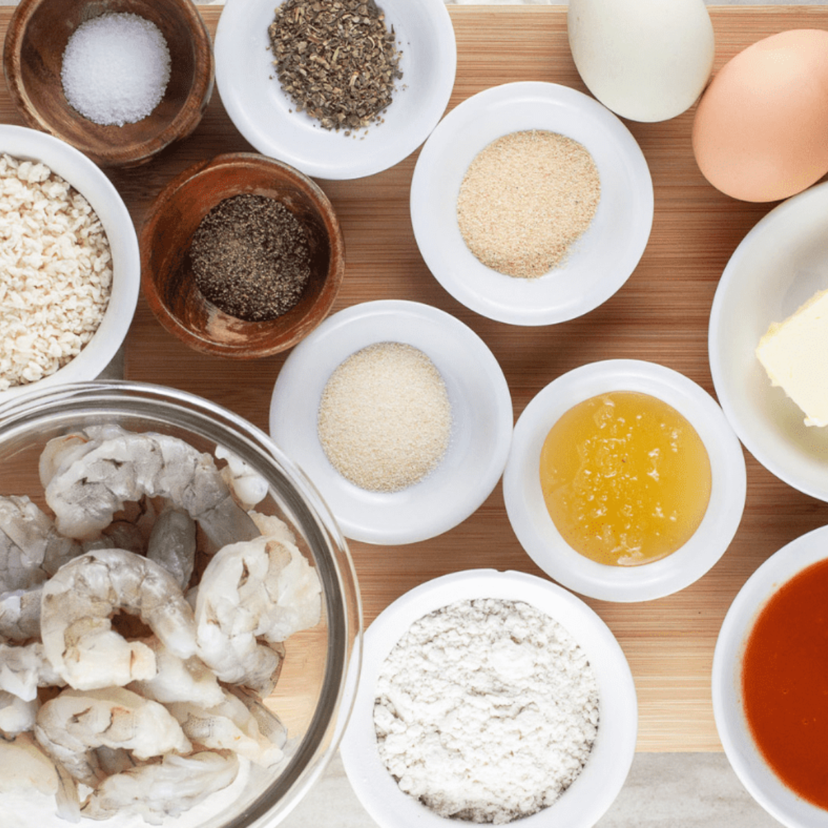 Ingredients needed for Easy Air Fryer Hooter's Buffalo Shrimp on kitchen table.