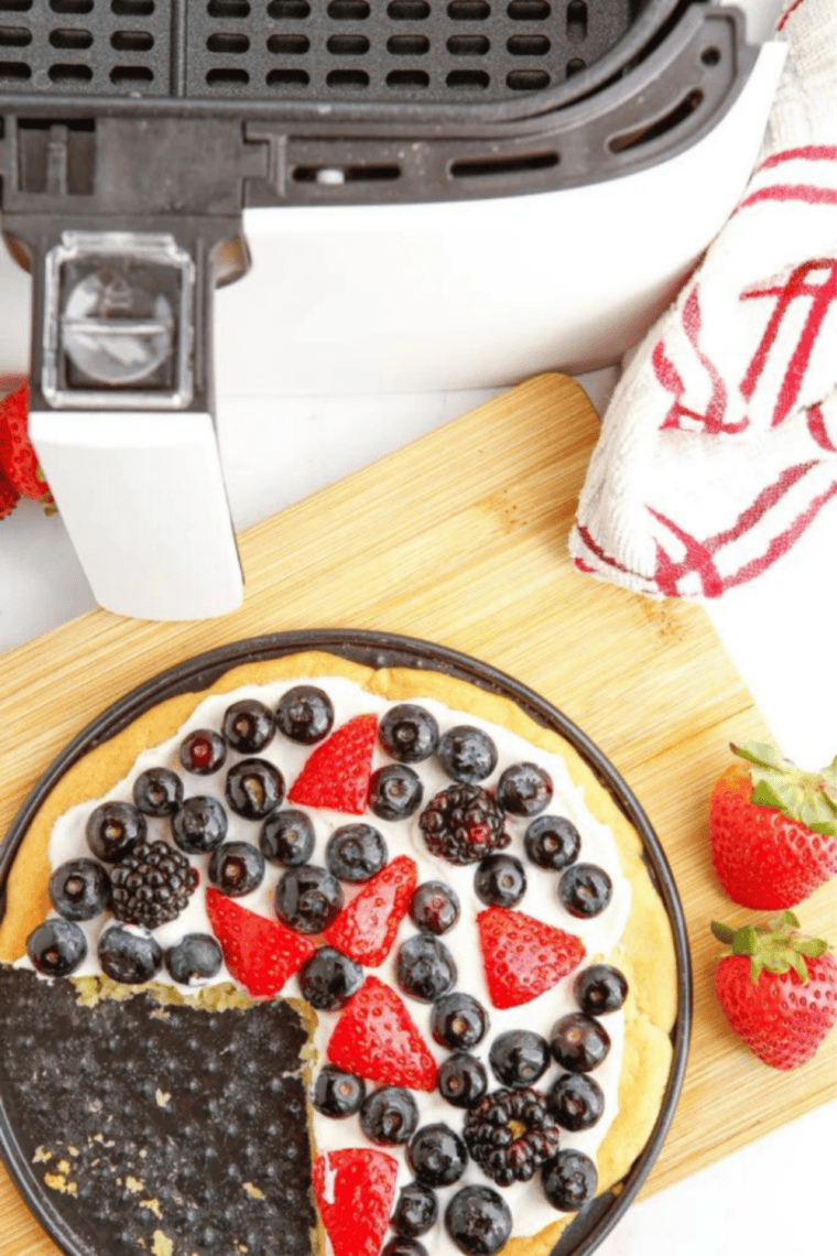 Air Fryer Sugar Fruit Pizza &ndash; soft, golden sugar cookie crust topped with creamy frosting and fresh, colorful fruit. Quick, easy, and perfect for parties, snacks, or dessert.