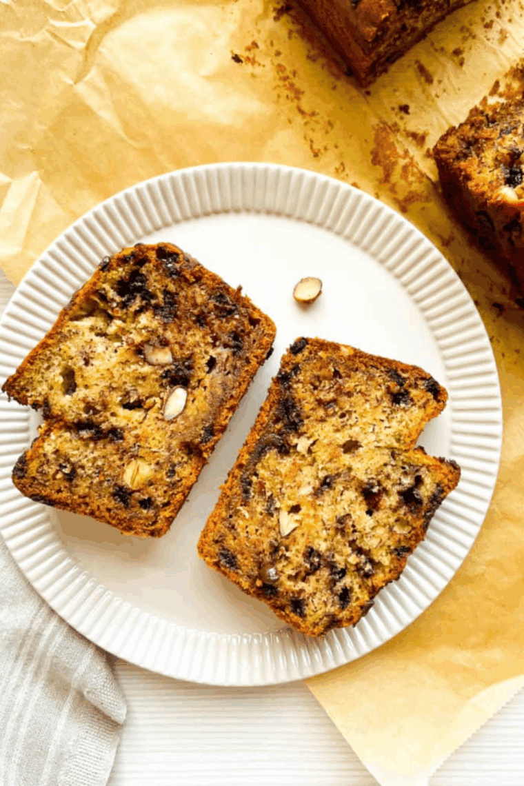 Moist almond chocolate banana bread fresh out of the air fryer, sliced and ready to serve.
