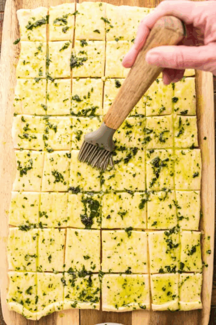 Placing the dough nuggets in a single layer in the lightly sprayed air fryer basket before cooking for 5–6 minutes.
