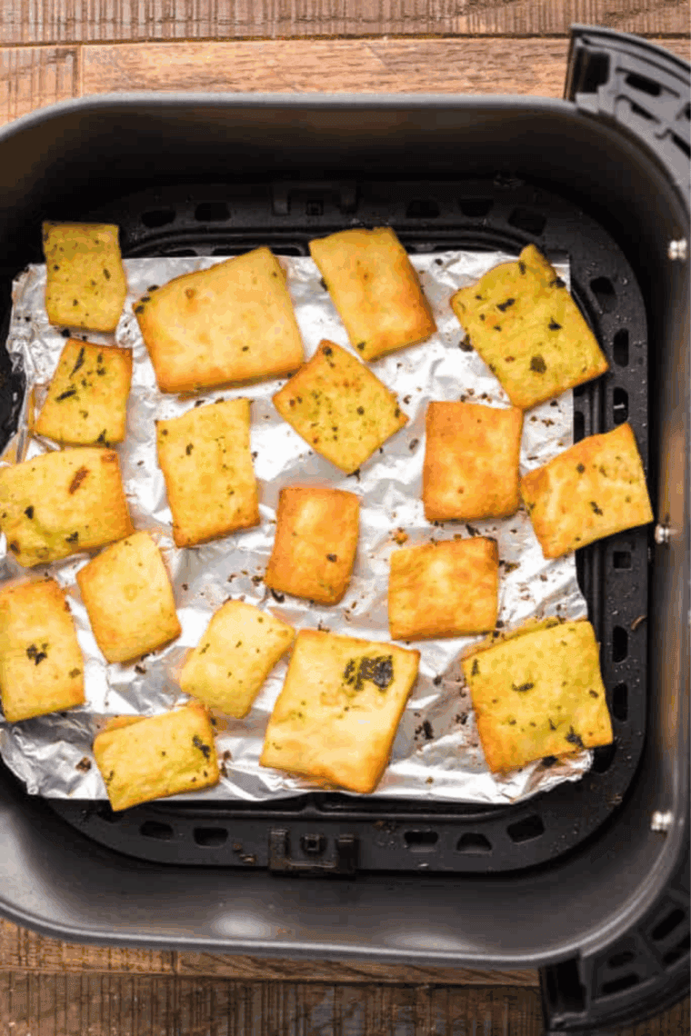 Cooking Domino’s Garlic Bread Bites in the air fryer.
