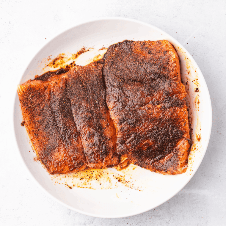 Salmon fillets patted dry, rubbed with olive oil and BBQ seasoning, salt, and pepper