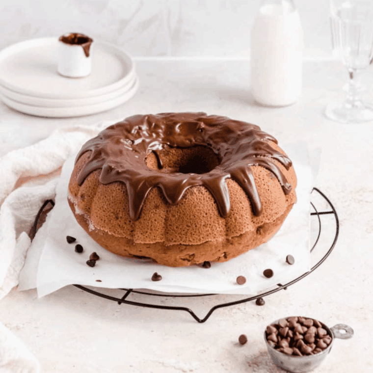 Golden chocolate chip bundt pound cake made in an air fryer, sliced and ready to serve.