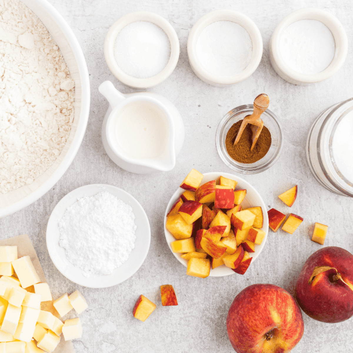 Ingredients needed for Easy Air Fryer Peach Scones on kitchen table.