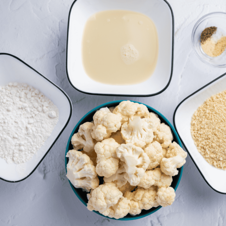 Ingredients needed for Easy Air Fryer Teriyaki Cauliflower on kitchen table.