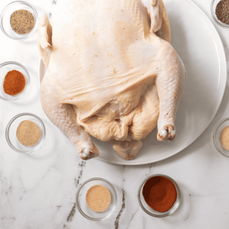 Ingredients needed for Easy Copycat McCormick Perfect Pinch Rotisserie Chicken Seasoning Recipe on kitchen table.
