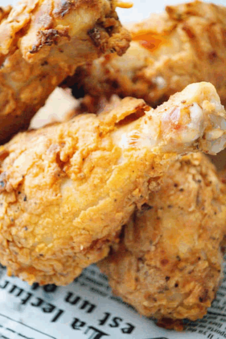 Golden, crispy Ninja Foodi fried chicken with juicy interior