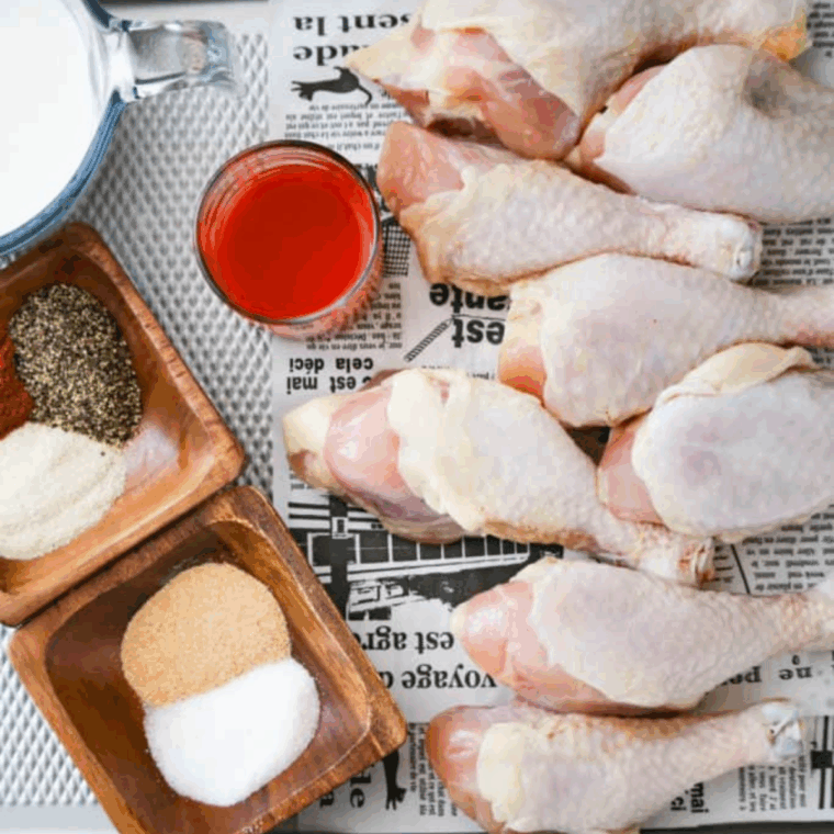 Ingredients needed for Easy Crispy Ninja Foodi Fried Chicken Recipe on kitchen table.