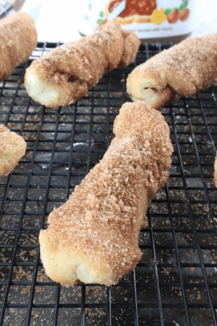 Homemade churros stuffed with Nutella made in air fryer basket