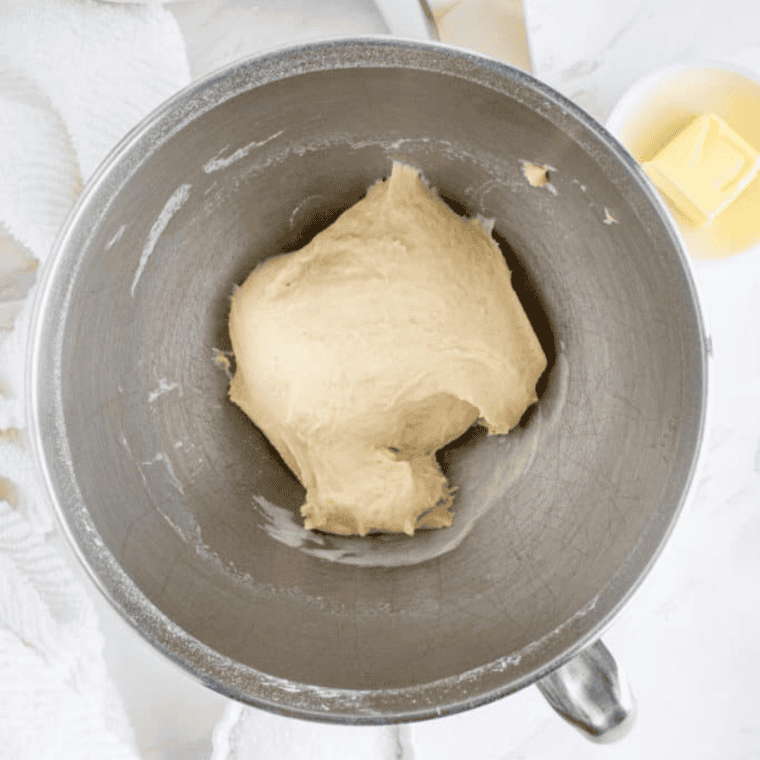 Pretzel dough kneaded into a smooth ball with a stand mixer dough hook