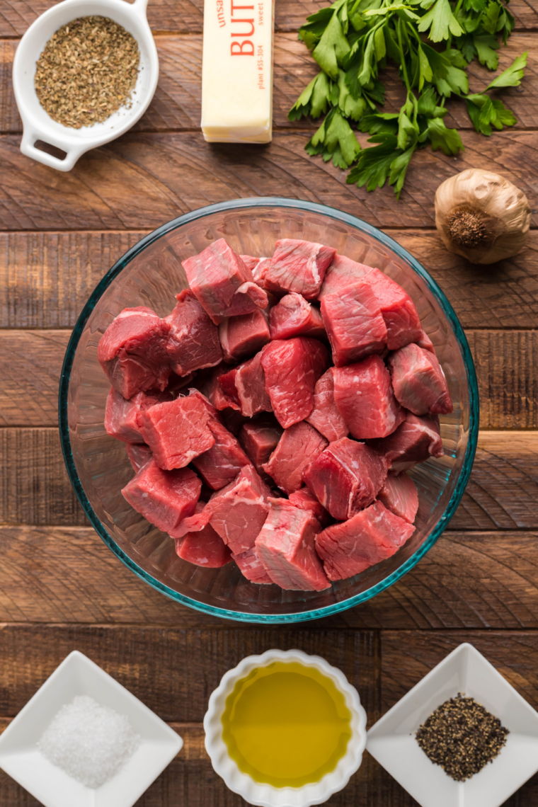 Steak being patted completely dry with paper towels before cooking to ensure a proper sear in the air fryer.