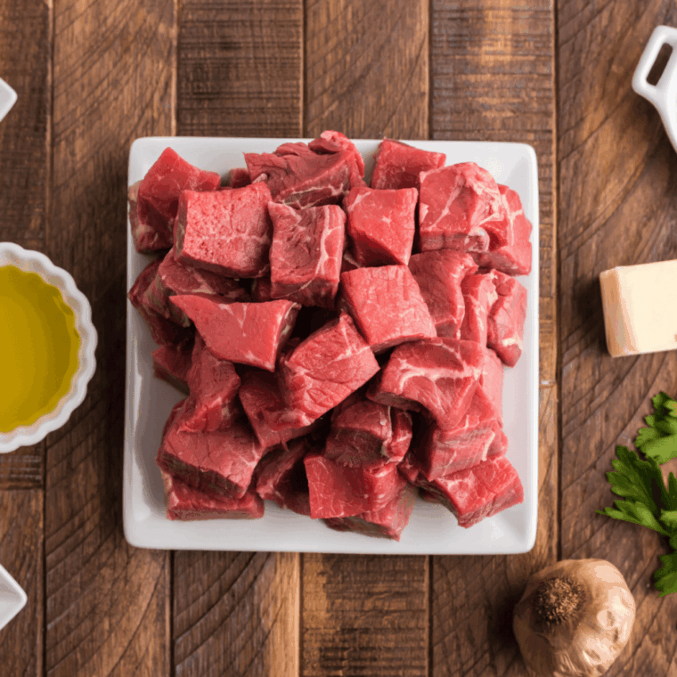 Ingredients needed for Air Fryer Garlic Butter Steak Bites &mdash; Perfect Sear, Rich Butter Sauce, Ready in 15 Minutes on kitchen table.