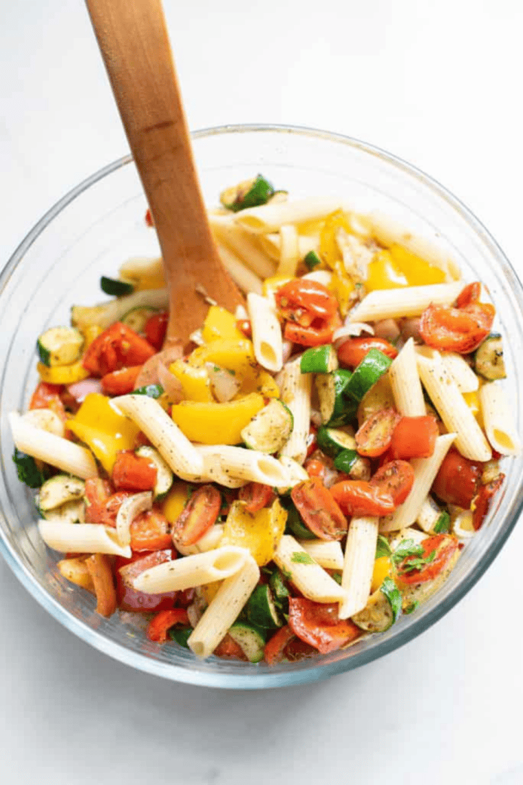 Crunchy pasta salad made in air fryer with colorful toppings