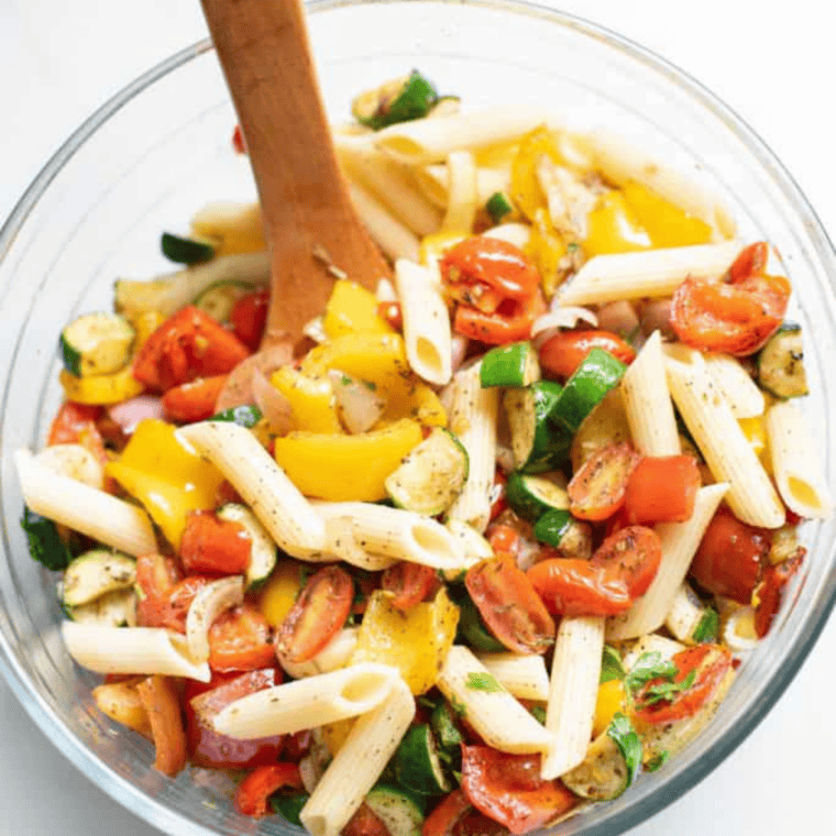 Air fryer pasta salad with roasted vegetables in serving bowl