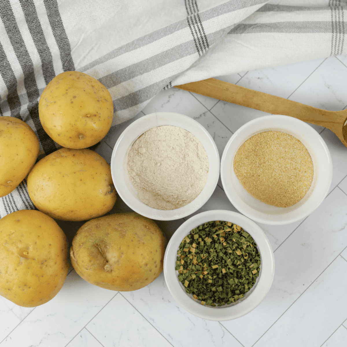 Ingredients needed for Easy Air Fryer Sour Cream and Onion Potato Chips on kitchen table.