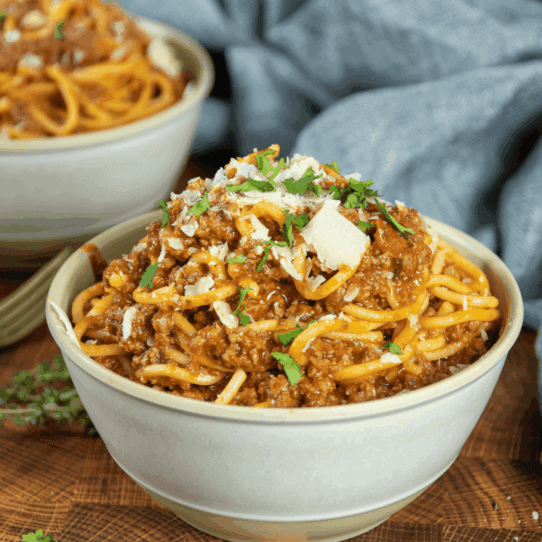 Ninja Foodi spaghetti with tender noodles and flavorful meat sauce served in a bowl.