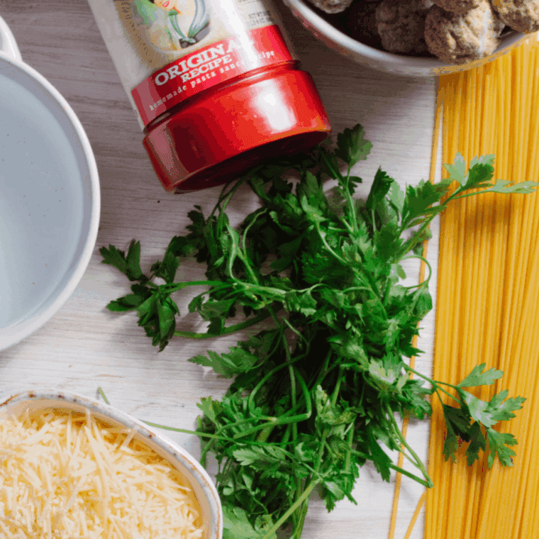 Ingredients needed for Quick and Easy Ninja Foodi Spaghetti on kitchen table.