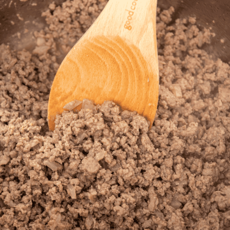  Ground beef, onions, and seasonings sautéing in the Ninja Foodi with olive oil.