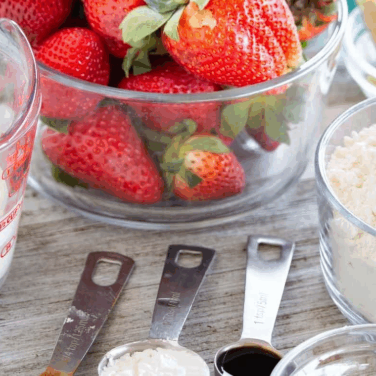 Ingredients needed for Air Fryer Strawberry Cobbler on kitchen table.