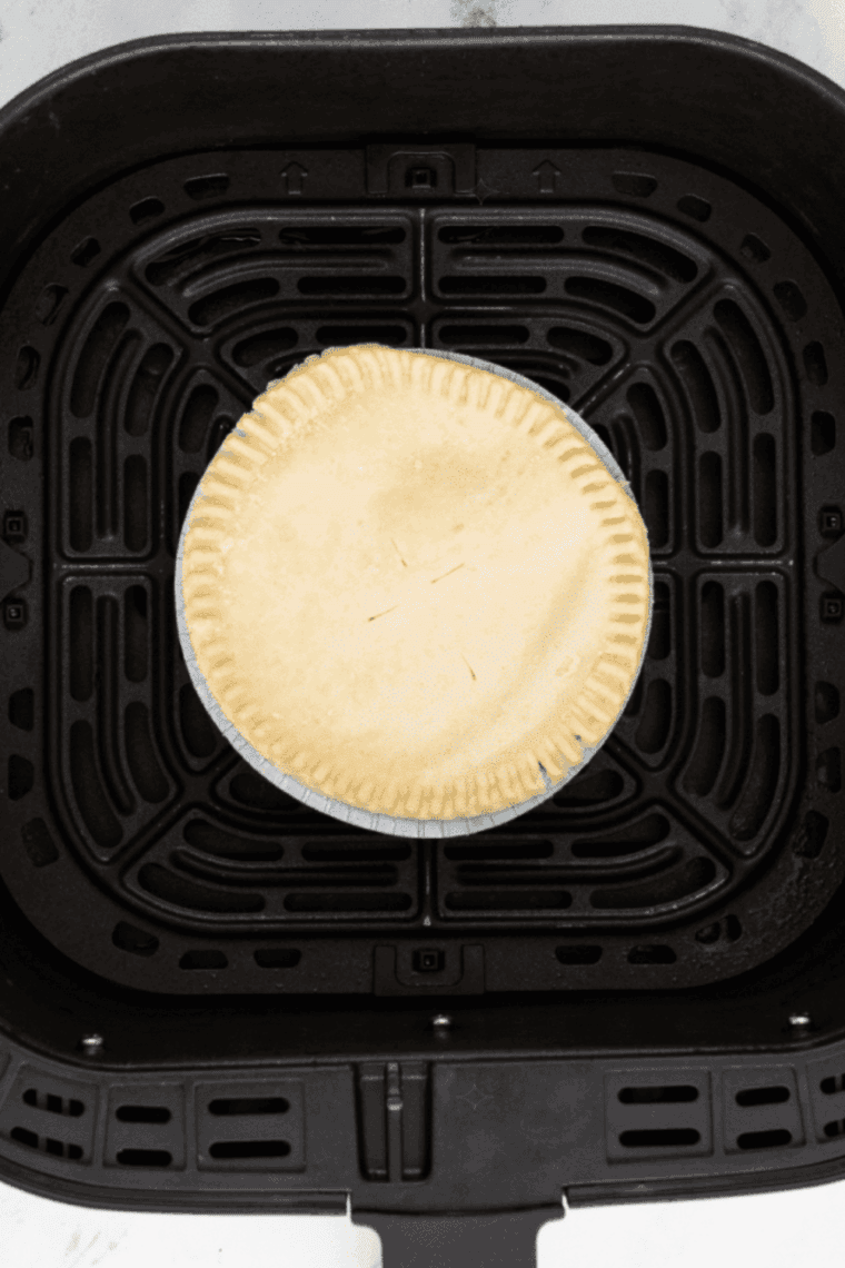 Banquet Turkey Pot Pie in the air fryer basket.