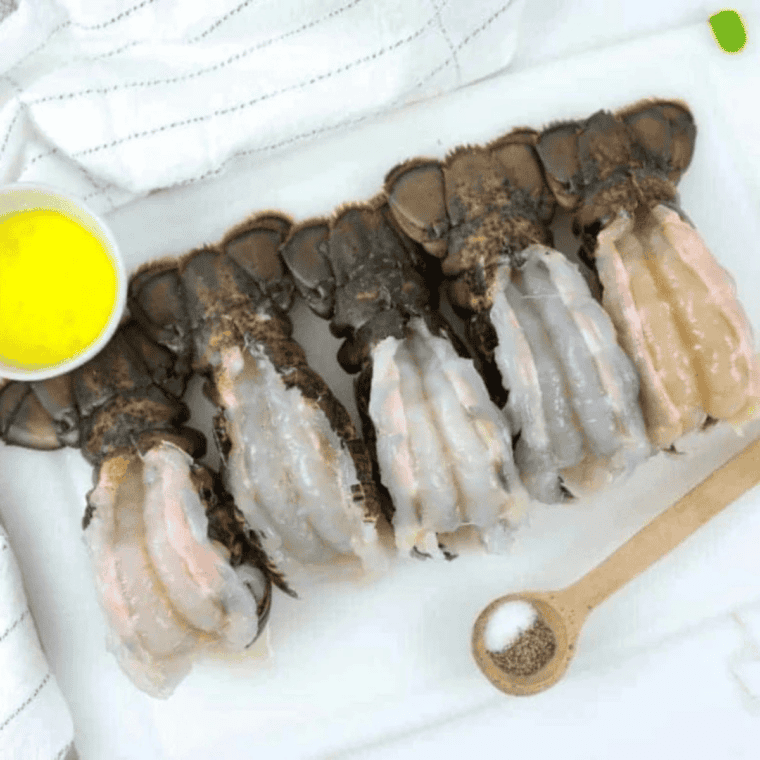 Ingredients needed for Blackstone Griddle Lobster Tails on kitchen table.