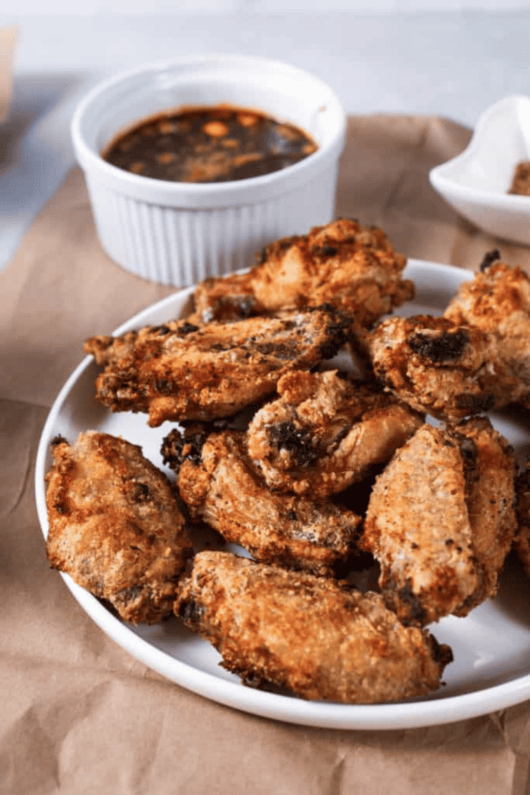 Crispy copycat Wingstop atomic wings served hot with dipping sauce