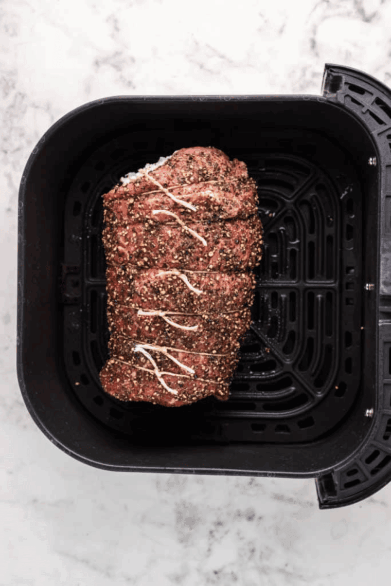 Set cook time for air fryer, flipping halfway.