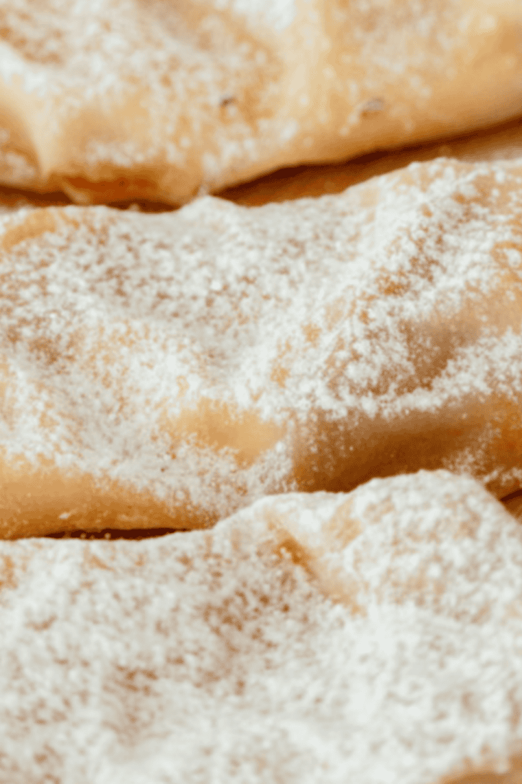 Golden, crispy air fryer peach cobbler egg rolls with creamy cinnamon-peach filling