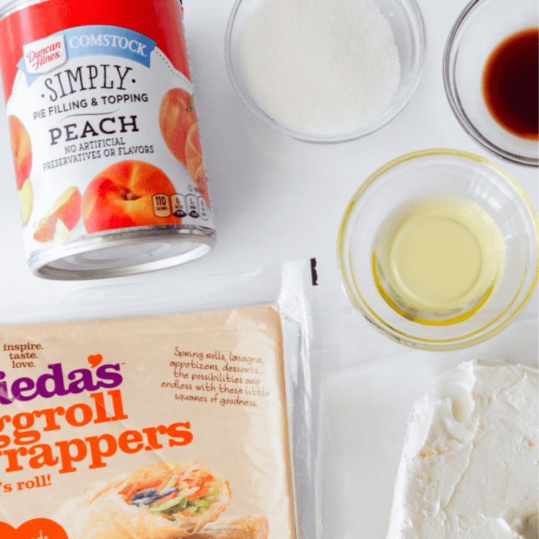 Ingredients needed for Easy Air Fryer Peach Cobbler Egg Rolls on kitchen table.