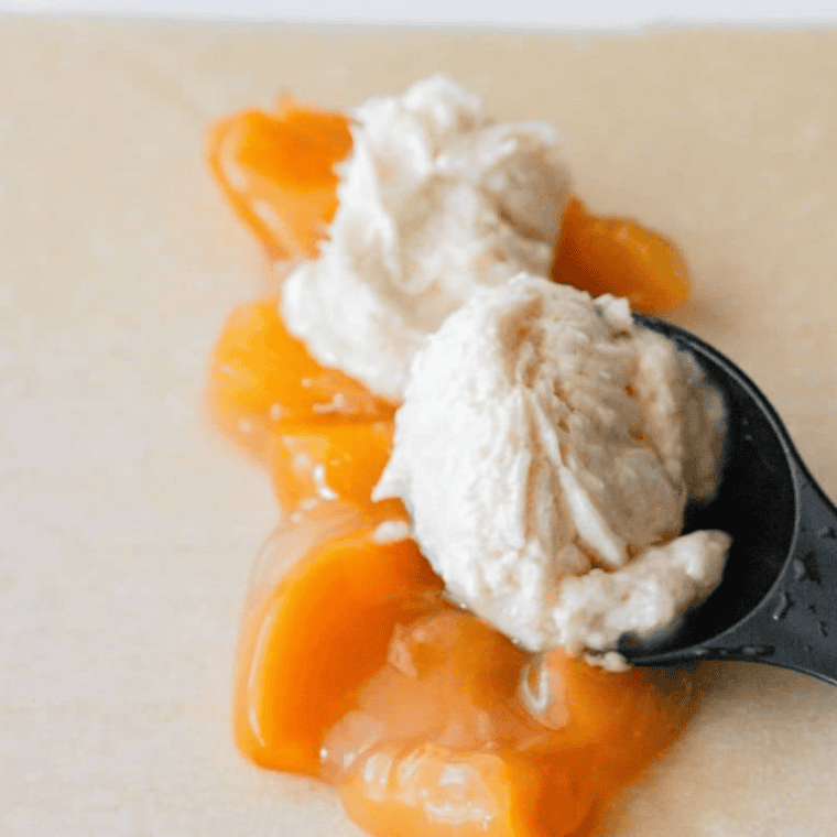 Thickened peach filling in a saucepan, ready to cool for egg rolls
