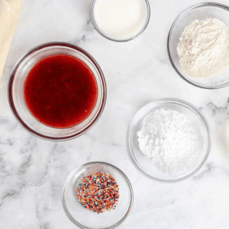 Ingredients needed for Easy Air Fryer Strawberry Pop-Tarts  on kitchen table.